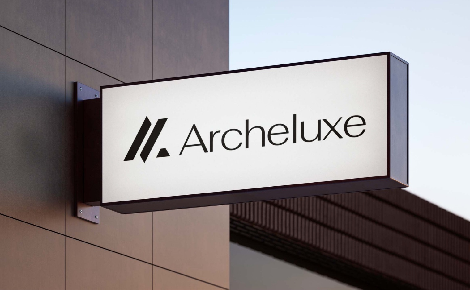 Archeluxe — gold signage on a dark architectural facade